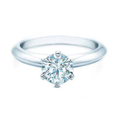 Tiffany diamond engagement rings - The round brilliant center diamond is set among four slim prongs, giving this timeless ring a feminine spirit with clean, contemporary lines. A slender band of micro-pavé-set diamonds lends the brilliant Tiffany Novo® a distinctly romantic sensibility with a modern edge. At Tiffany, we ethically source our diamonds.